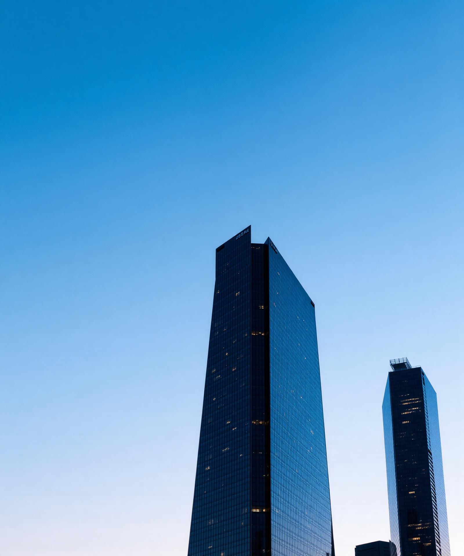 Modern financial district skyscrapers at twilight