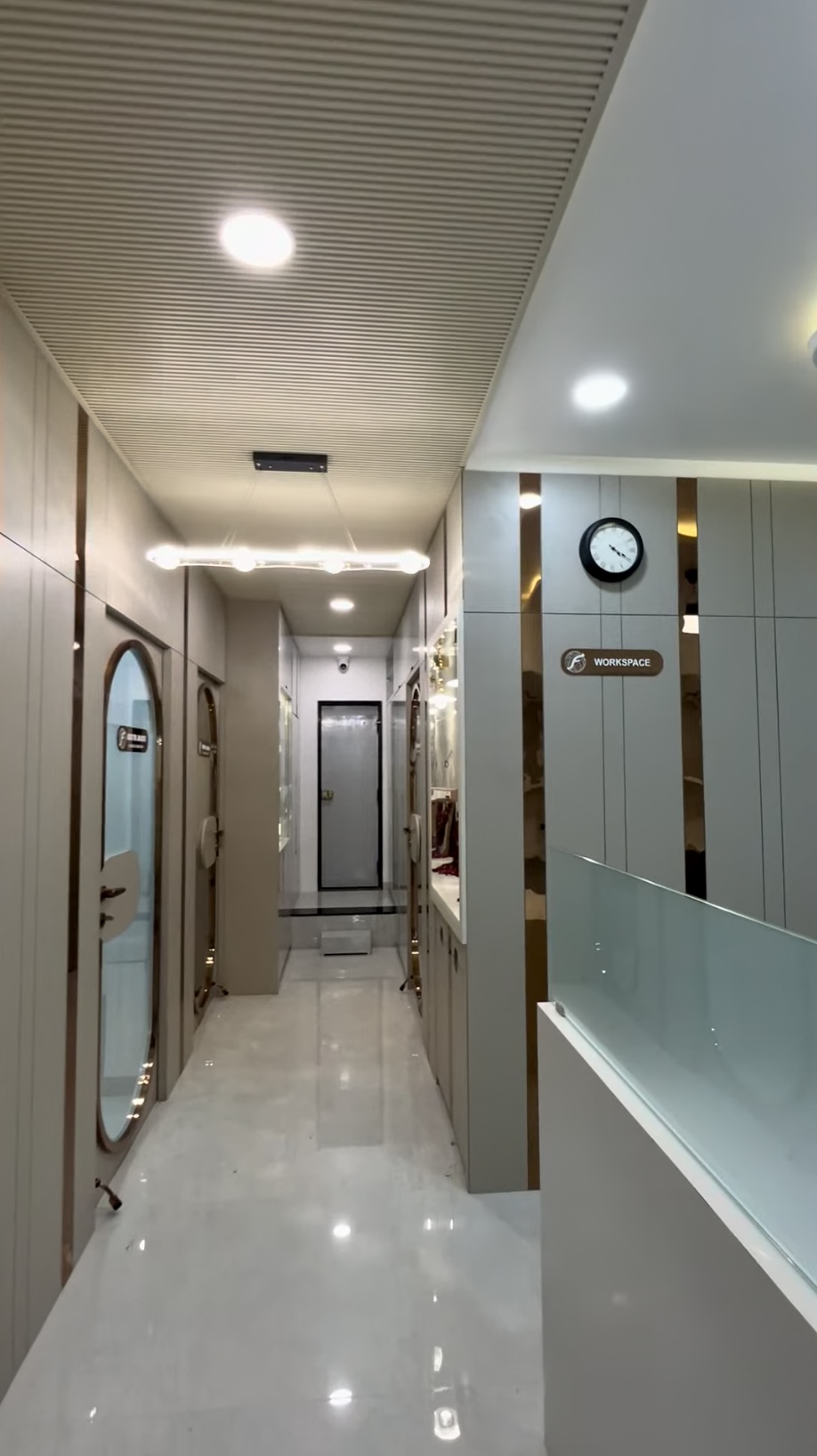 Workspace corridor with rose-gold accents