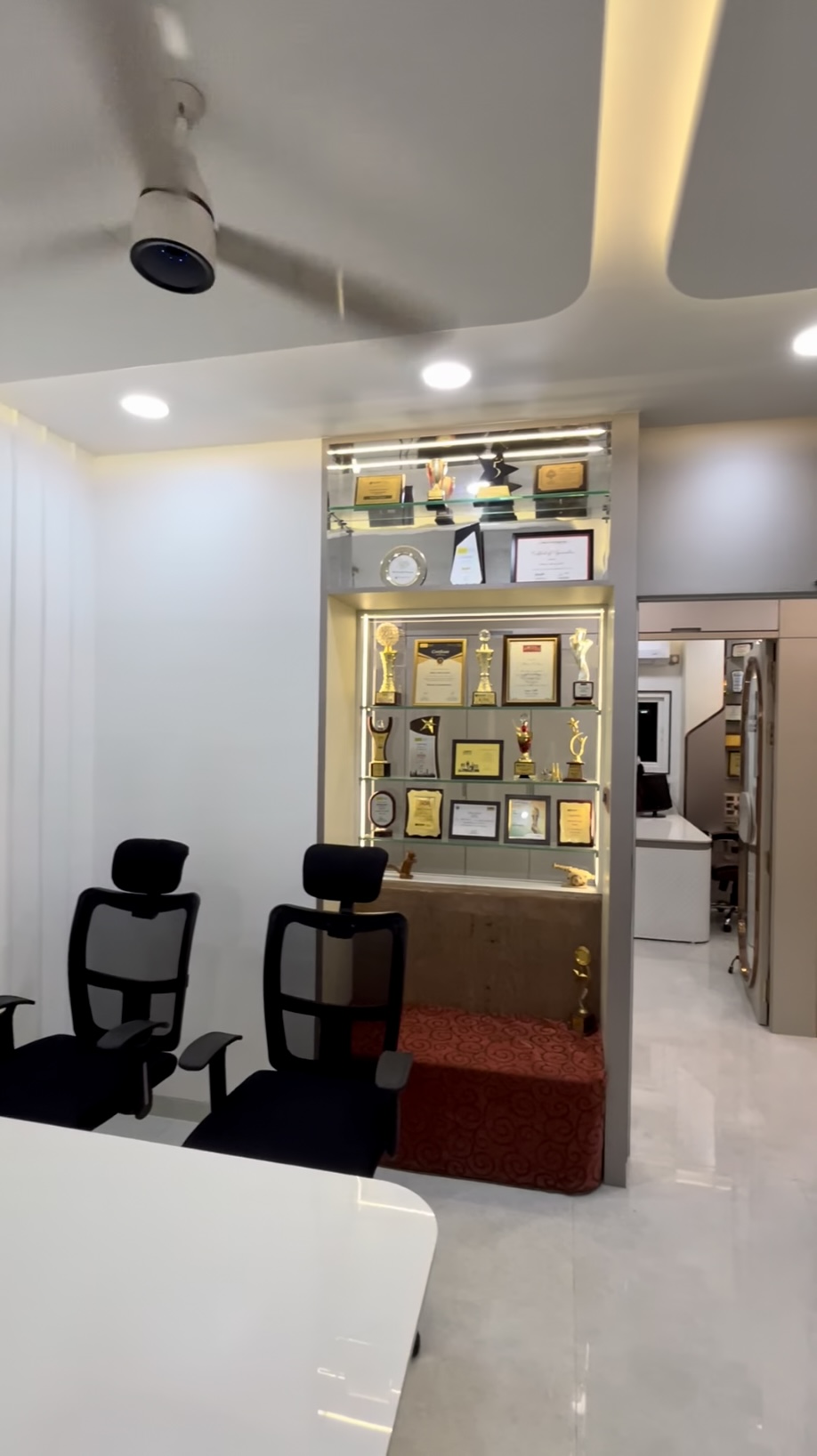 Trophy and accolades wall in the FinOrbit office